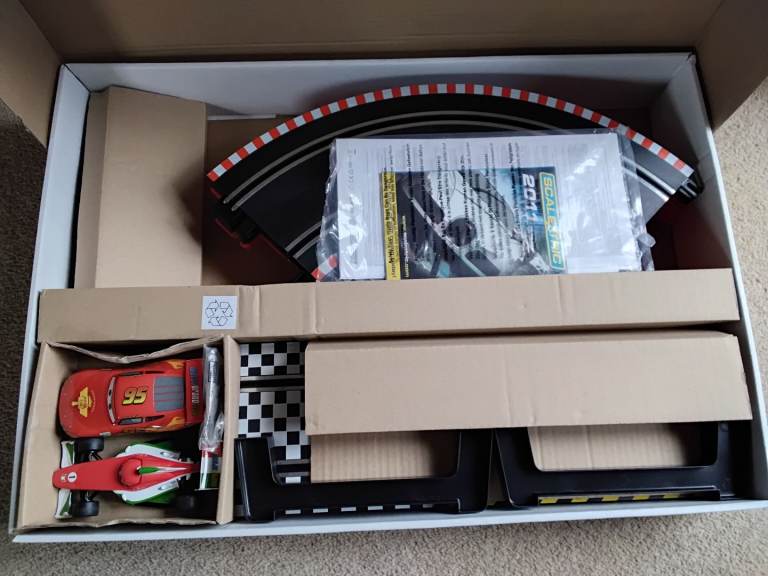 Scalextric - Disney Pixar Cars 2. 1:32 scale slot racing, World Grand Prix.