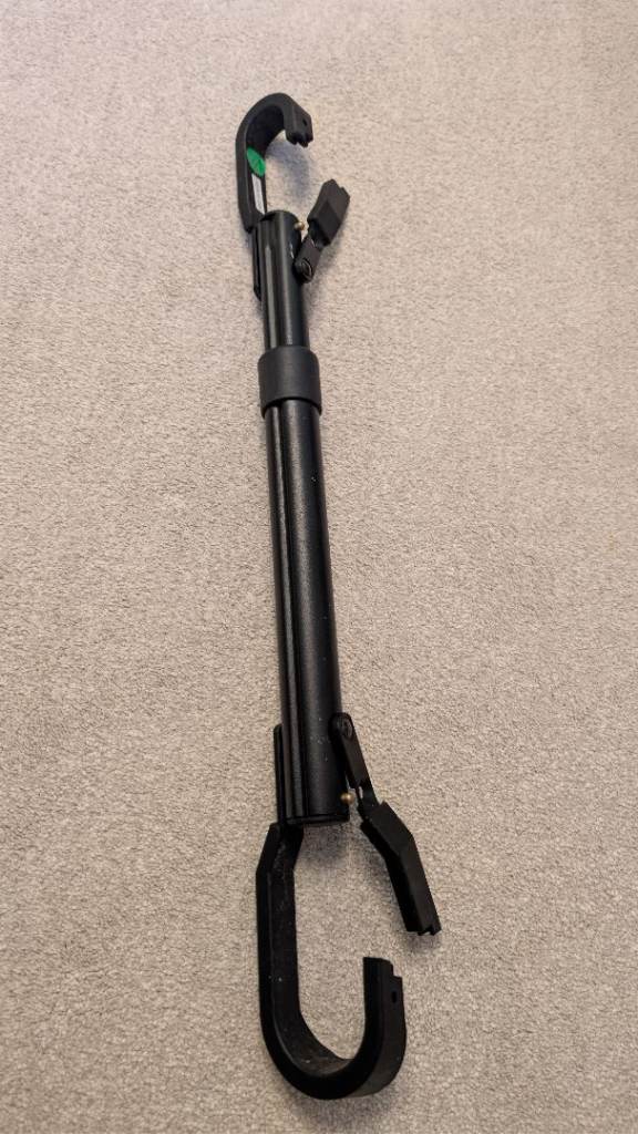Adjustable crossbar adaptor 