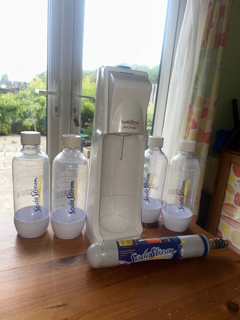 White SodaStream Fizz On-Line Drink Maker with Bottles