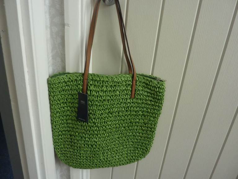 M&S straw bag in bright green