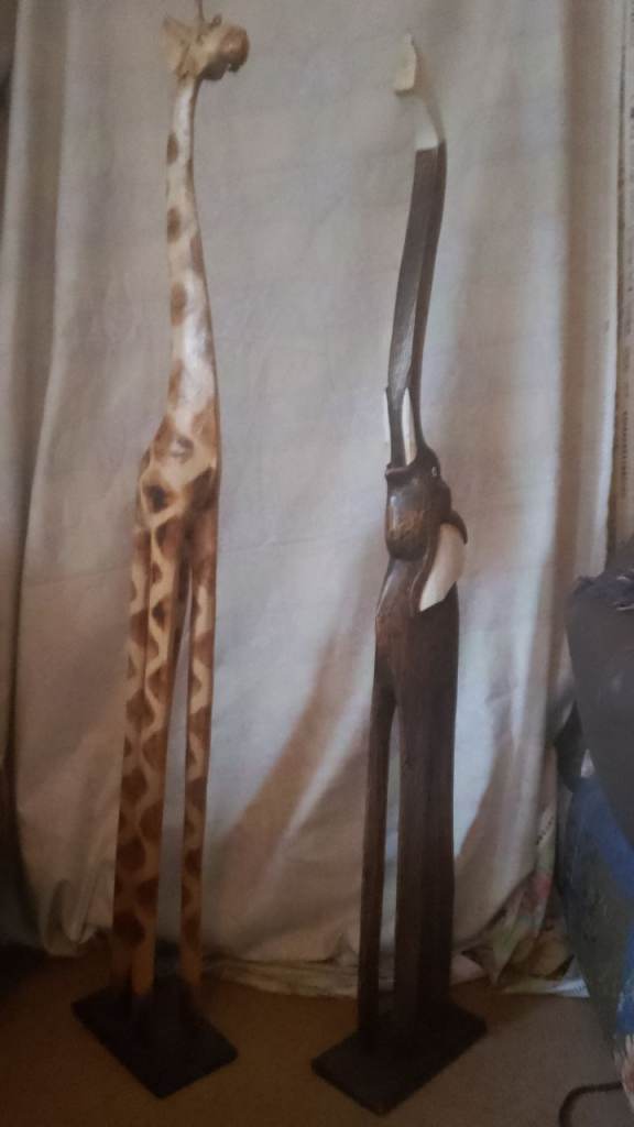 Beautiful large giraffe and elephant wooden figures 