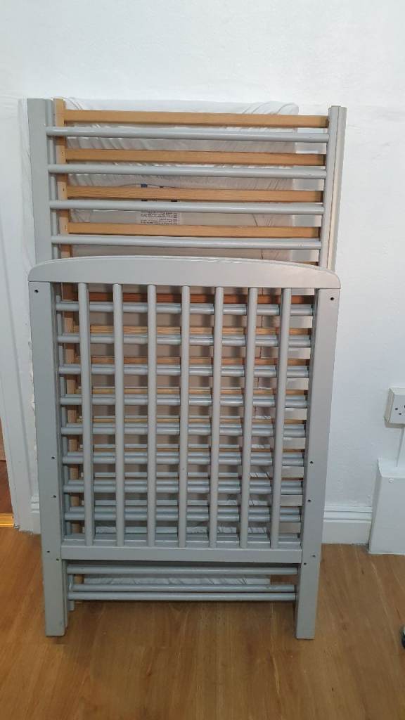 Cot and waterproof mattress