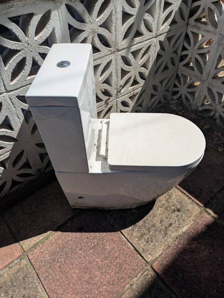 White Ceramic Toilet – Good Condition