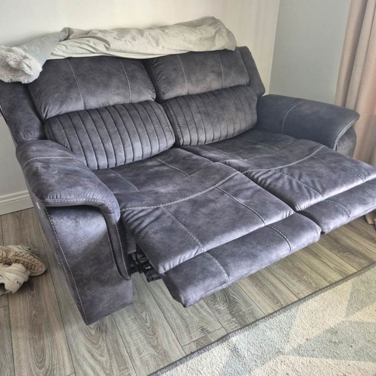 Big 2 seater electric reclining sofa.