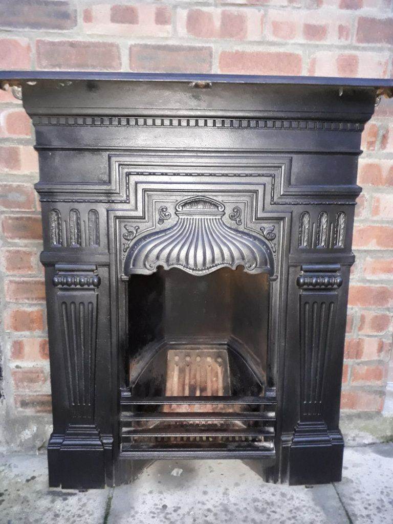 Fireplace, Cast Iron. Very pretty cast iron fireplace antique, With ash box.