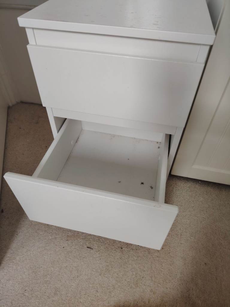 Ikea white bedside drawers. 