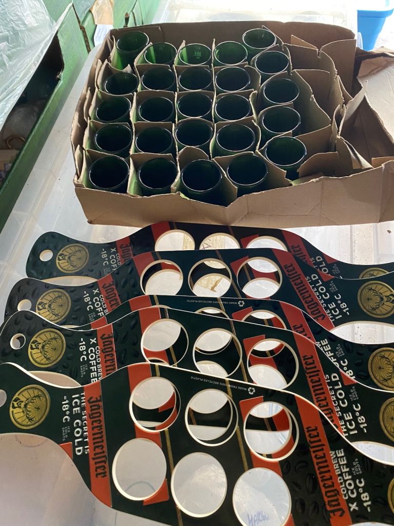 25 x Jagermeister shot glasses & 5 serving paddles