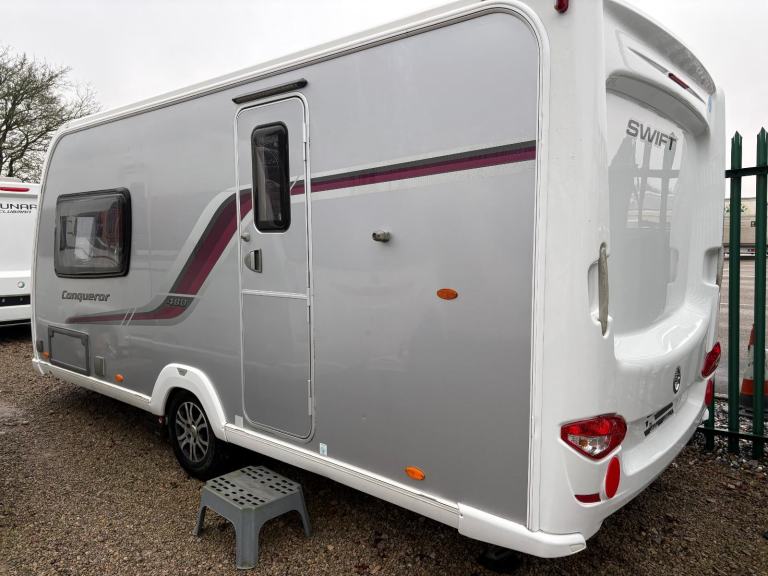 SWIFT CONQUEROR 480 - 2 BERTH CARAVAN WITH END WASHROOM AND MOTORMOVER