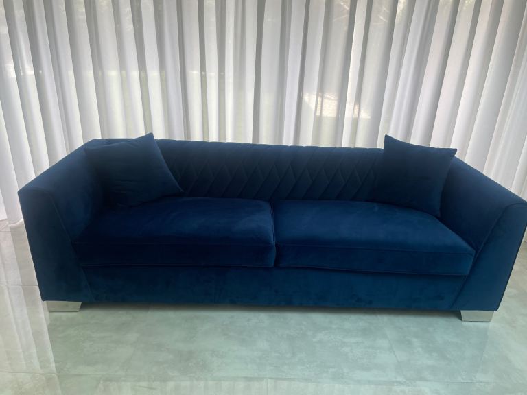 Blue suede sofa