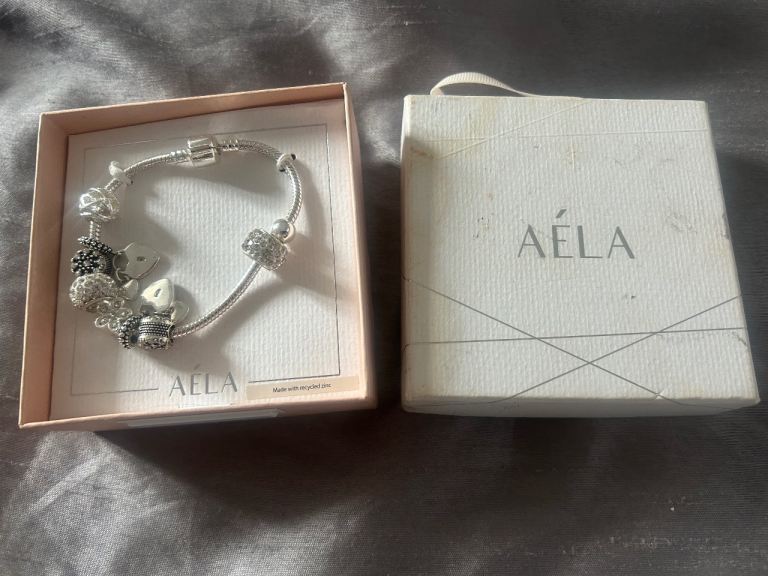 AELA Silver Charm Bracelet with Box – never taken out of the box