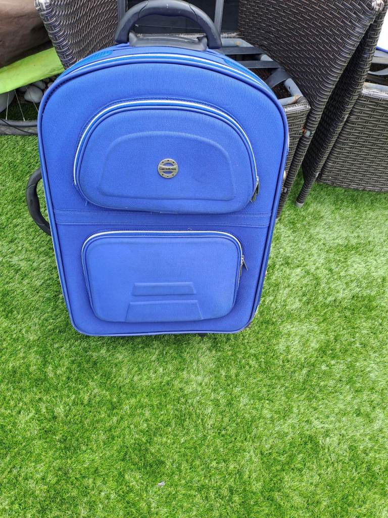 Large suitcase  60cm high, 40cm wide Depth 20cm