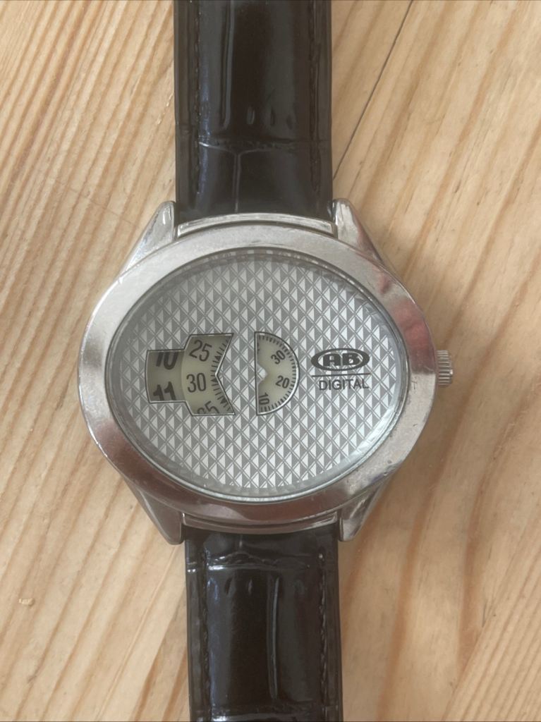 Jump hour watch in working condition 