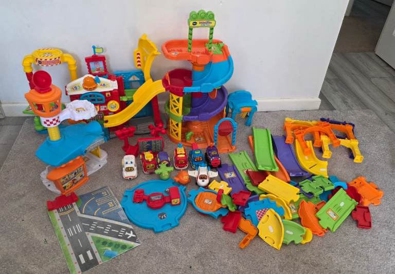 Huge bundle of toot toot vtech cars parking tower, firestation and airport toys