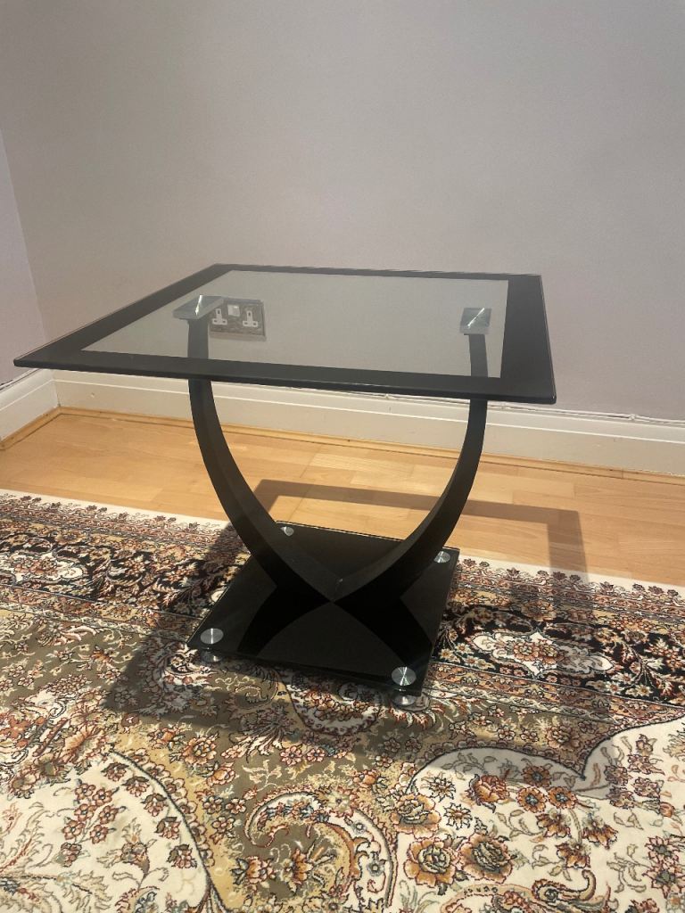 Black glass side table