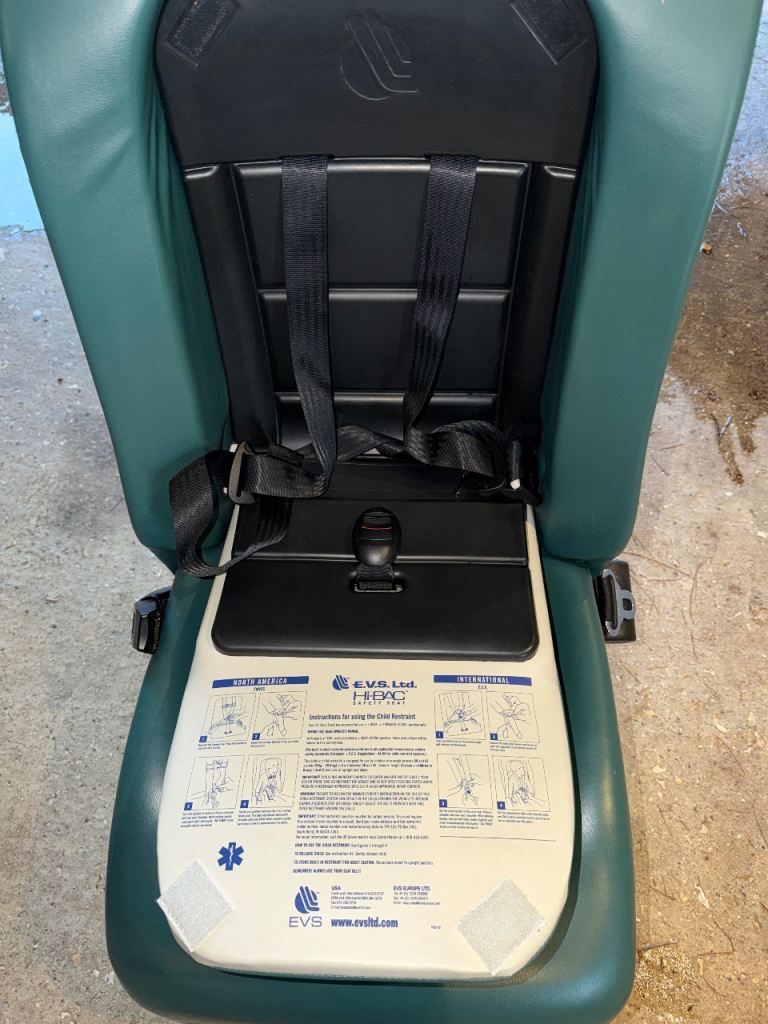 Single Seat with built in child restraint. 