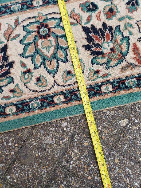 Antique rug over 9ft in lenght 