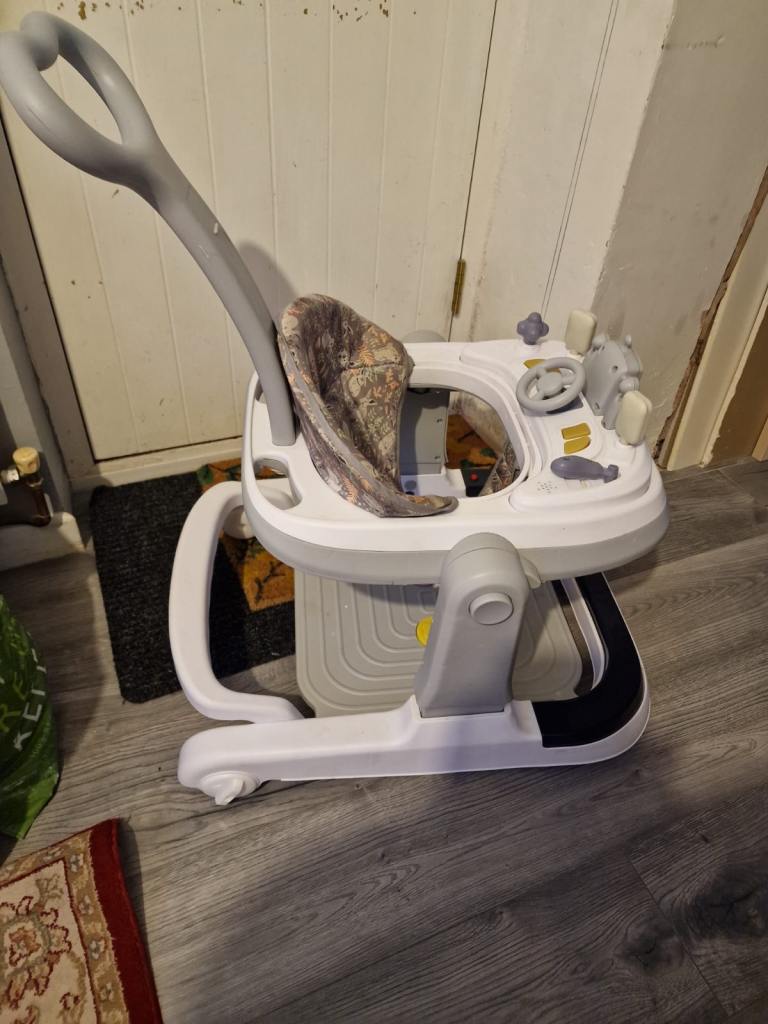Grey electric baby walker 