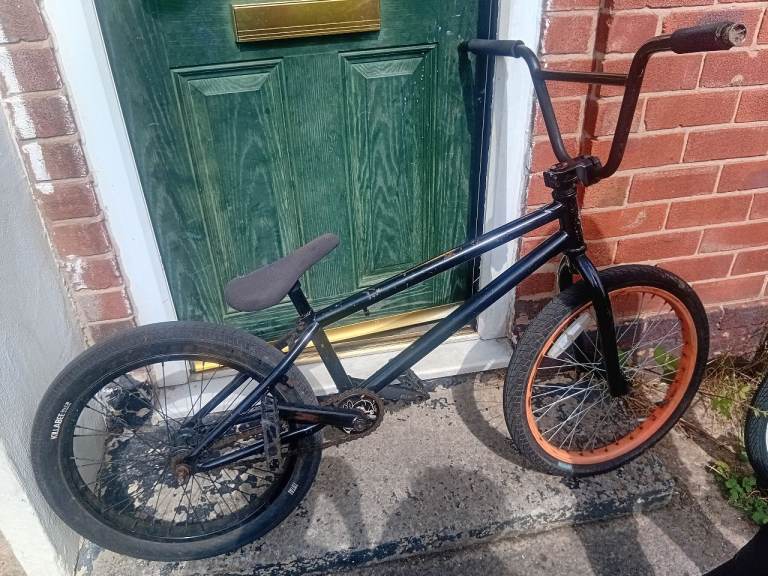 Black BMX Bike with Orange Rims – Good Condition