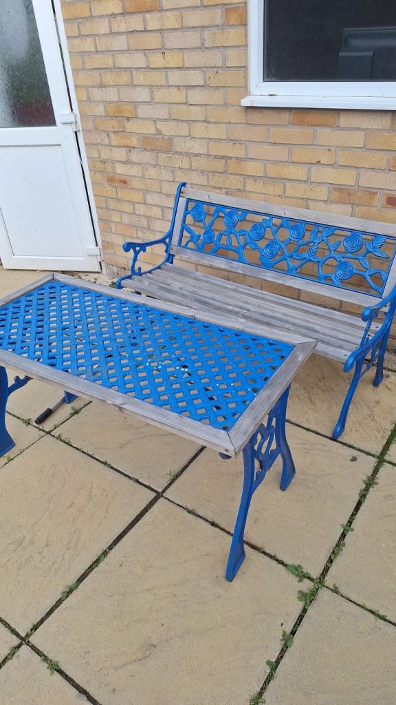 Wrought iron table and bench 