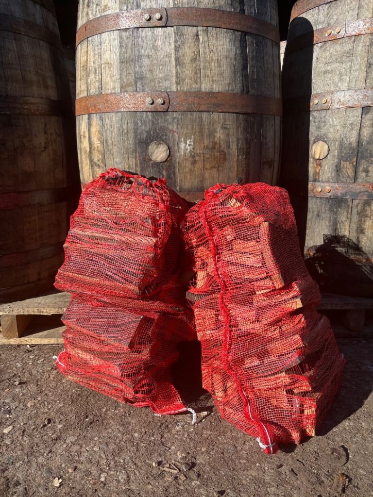 Seasoned Hardwood Firewood Logs in Nets – Ready to Burn