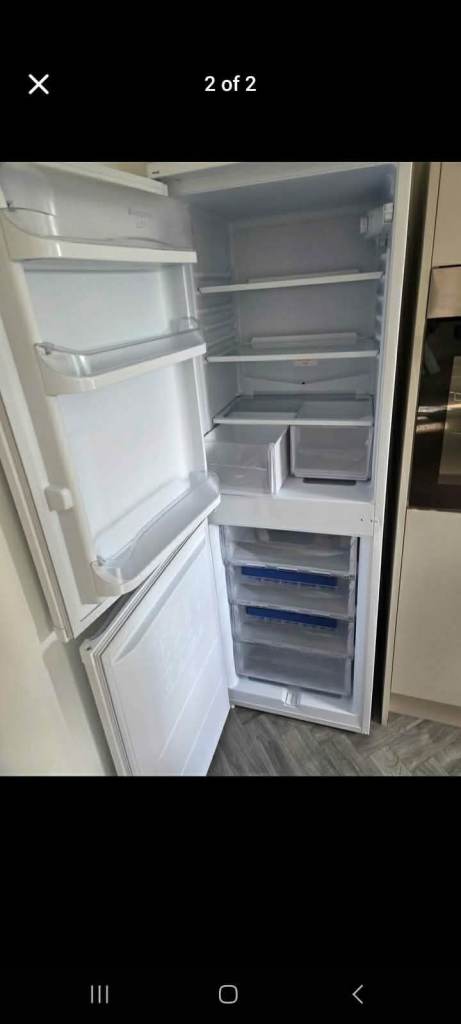 FREE DELIVERY SAME DAY Tall Hotpoint fridge freezer Works perfectly £180 or nearest offers 