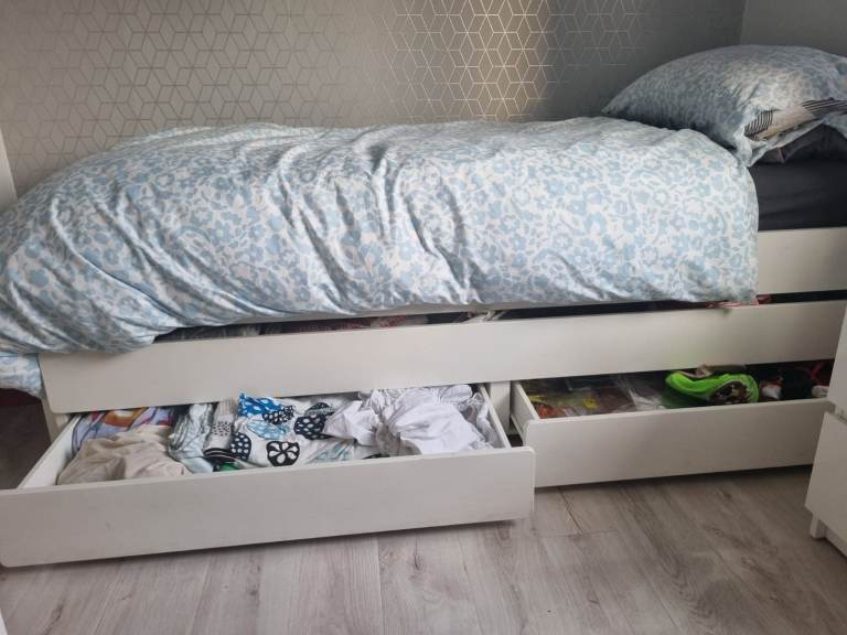 2 layered 2.single beds and 2 drawers