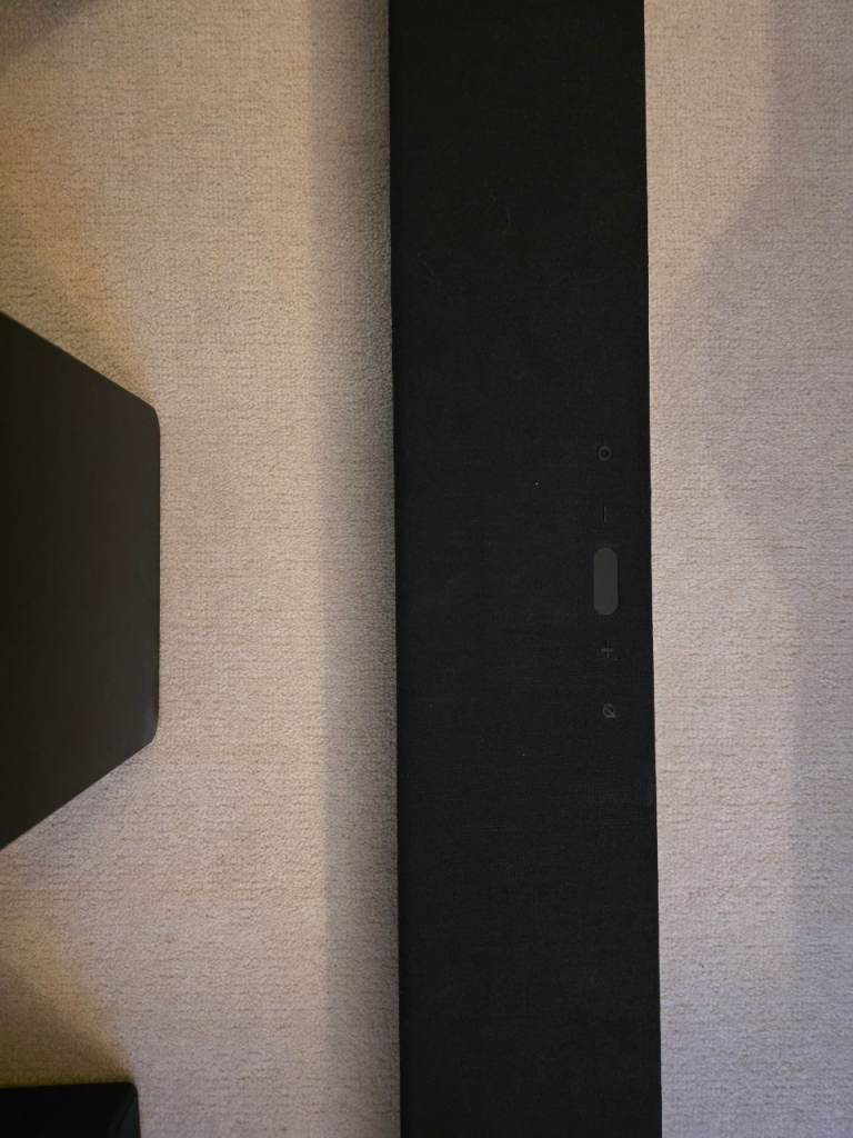 Samsung HW-Q950A soundbar with rear speakers and subwoofer