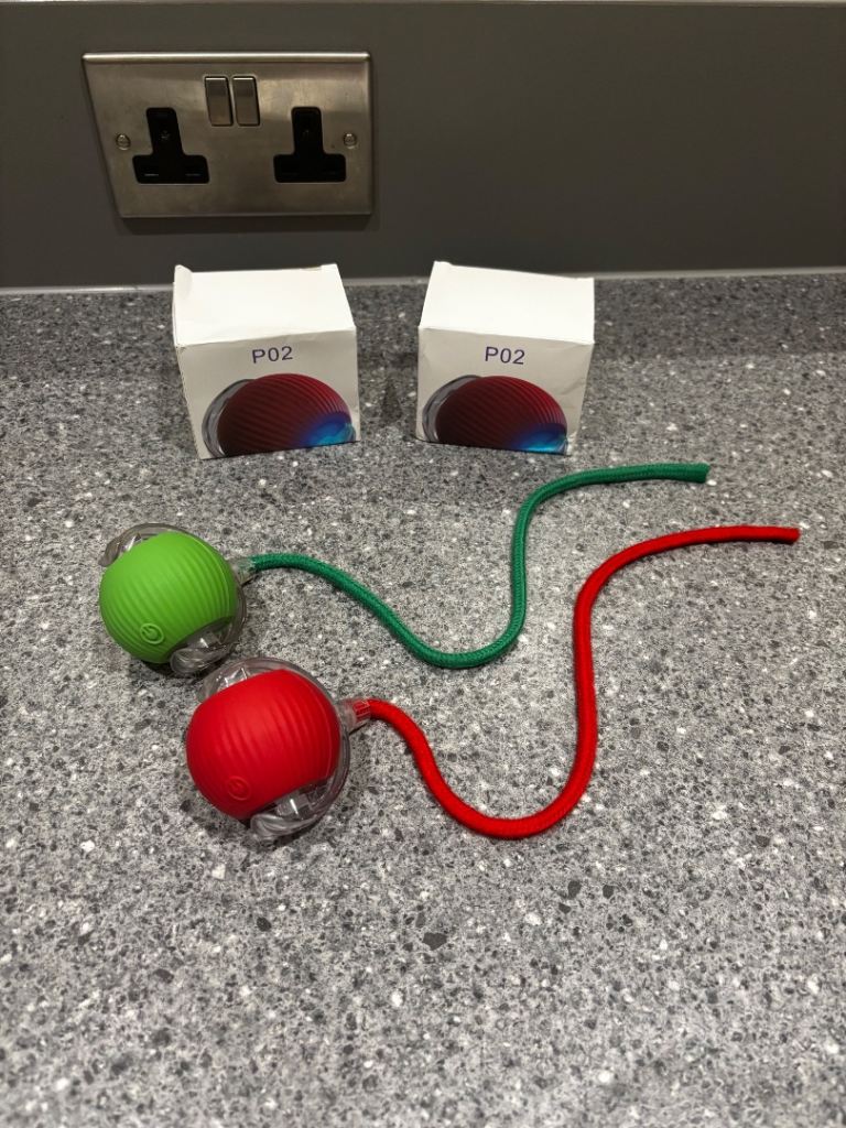 Two interactive cat play balls with ropes