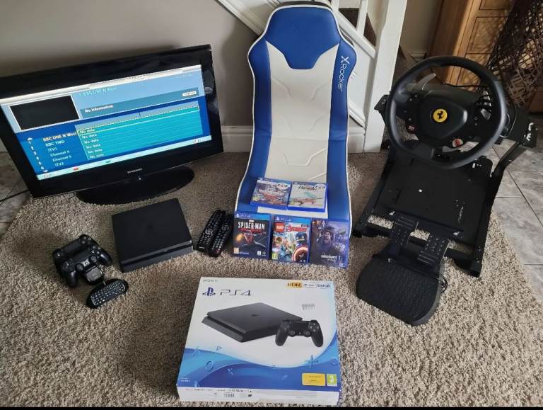 PS4, steering wheel, tv, games and chair