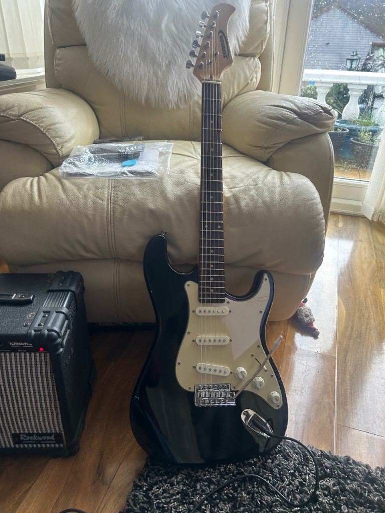 Electric Guitar with Rockwood Amp -