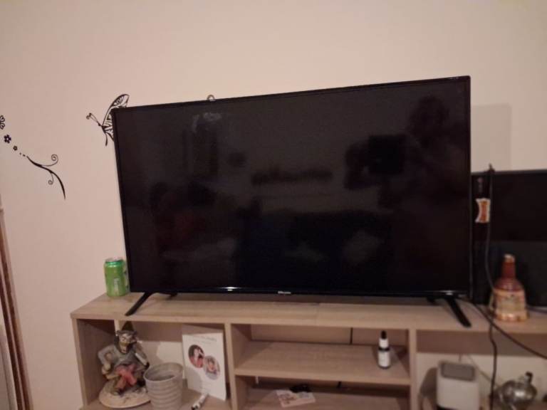 Large Black Flat Screen TV – Good Condition