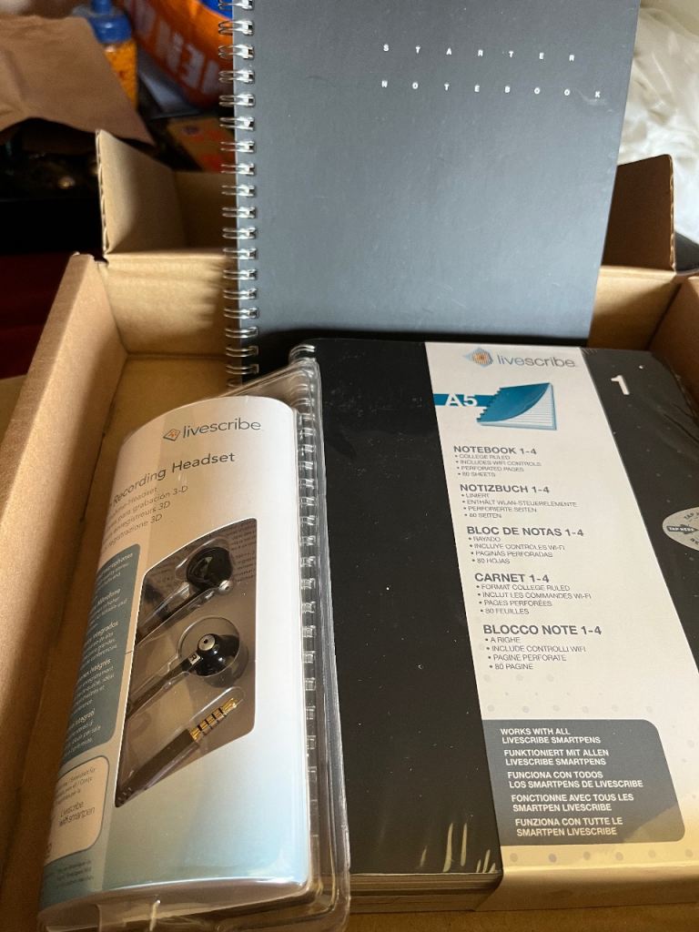 Notebooks and Livescribe 3-D Recording Headset 