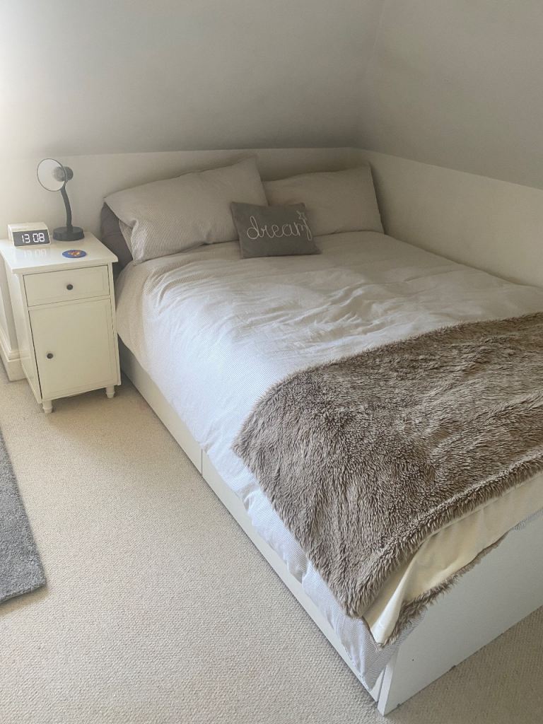 IKEA mordegal double mattress and Hemnes bedside table.