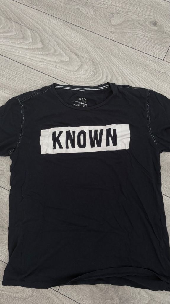 Men's Black T-Shirt with 'KNOWN' Print – Good Condition
