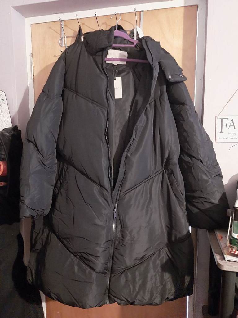 Brand new long black coat size 26