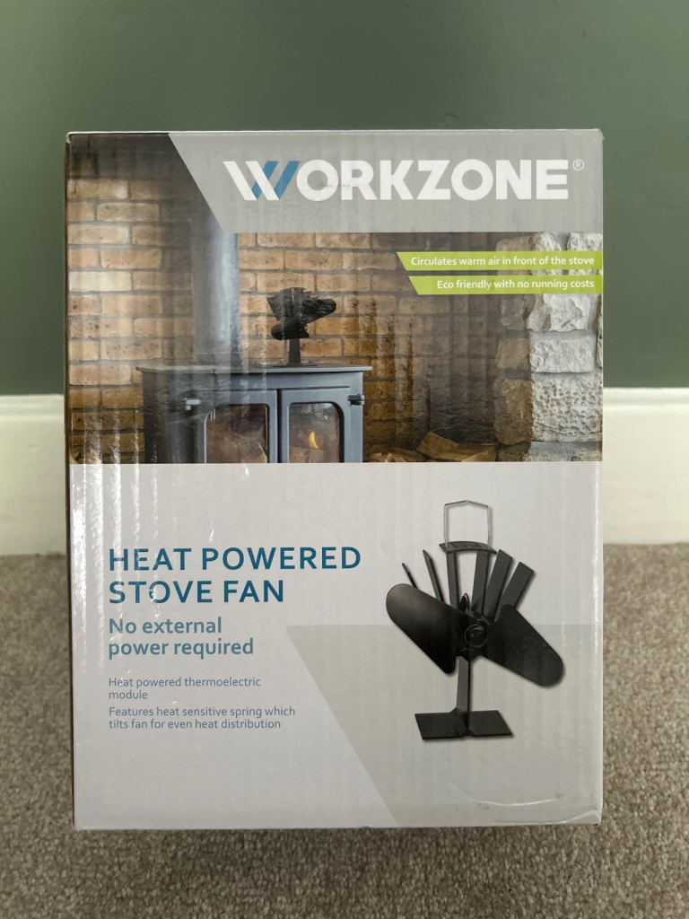 Heat powered stove fan + lots of logs for wood burner 