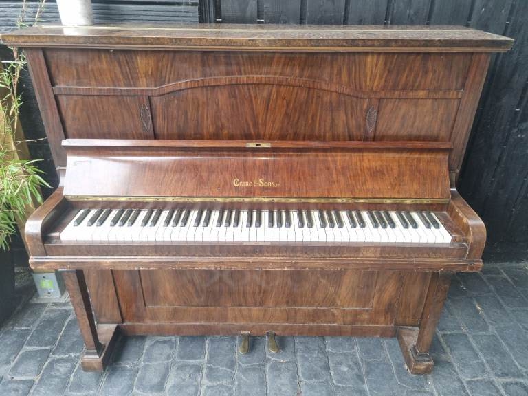 Crowe and sons upright piano can deliver
