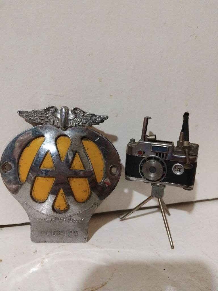 image for Vintage AA badge and vintage gas camera lighter