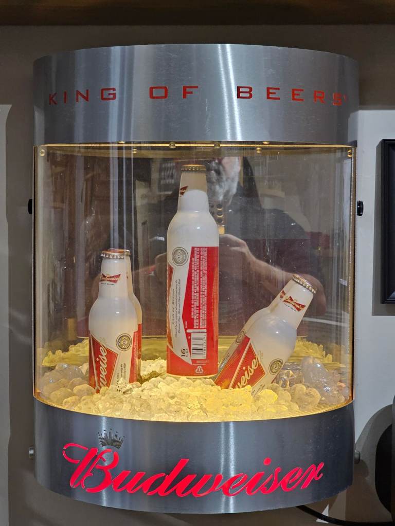 1980s Budweiser Levitating rotating beer bottle display.
