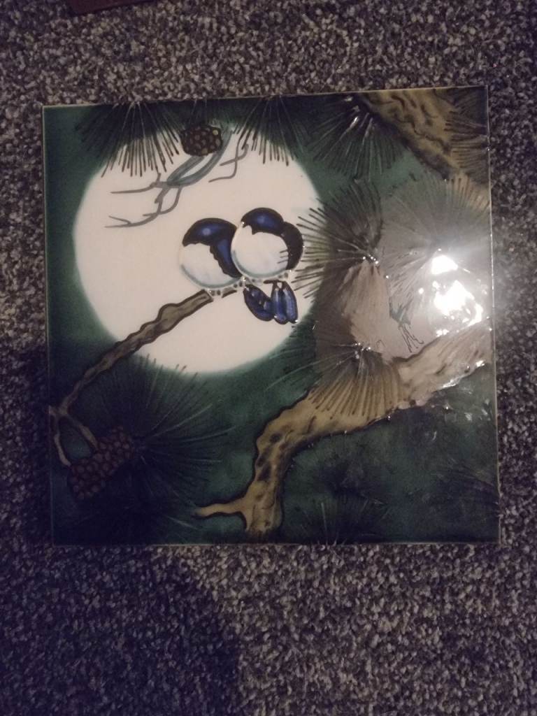 Decorative Ceramic Tile with Bird Design