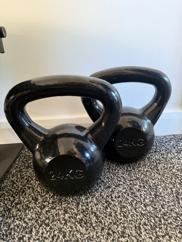 Pair of 24KG cast iron Kettlebells 
