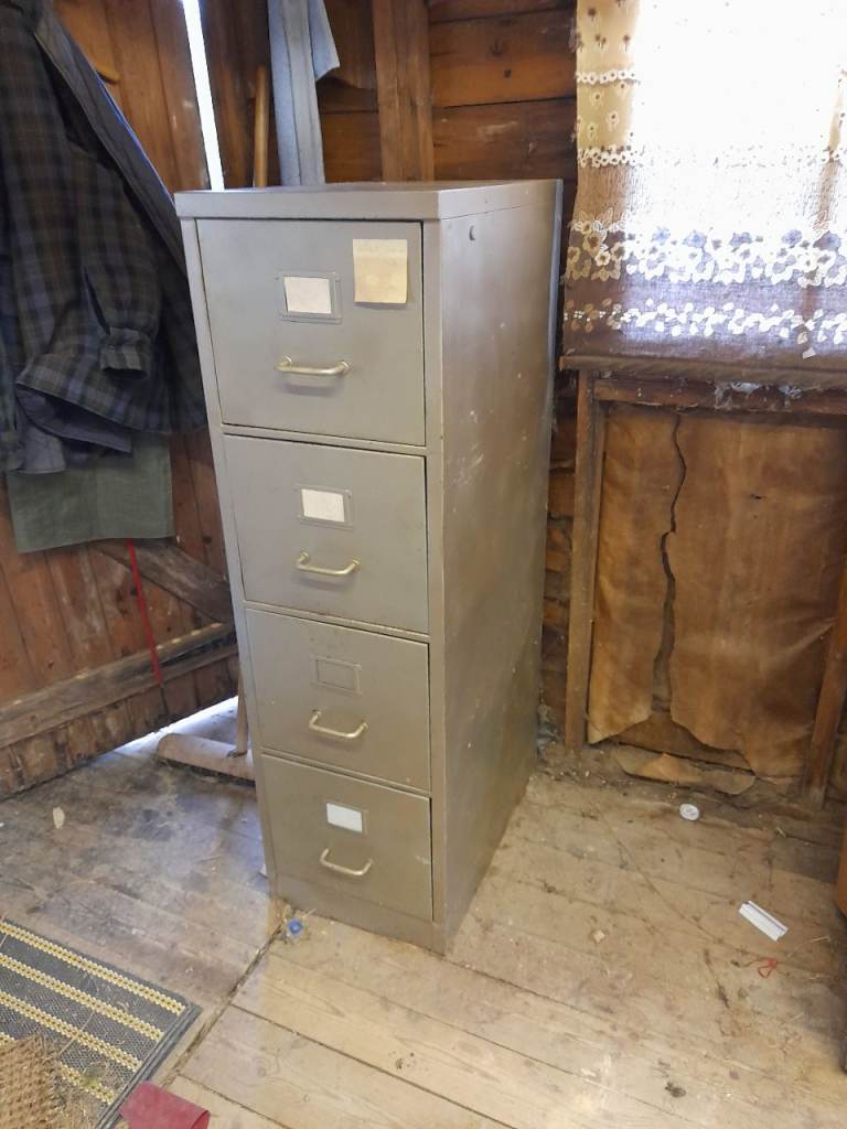 Vintage slimline metal filing cabinet