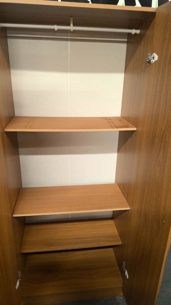 vintage single wardrobe with a rail and adjustable shelves