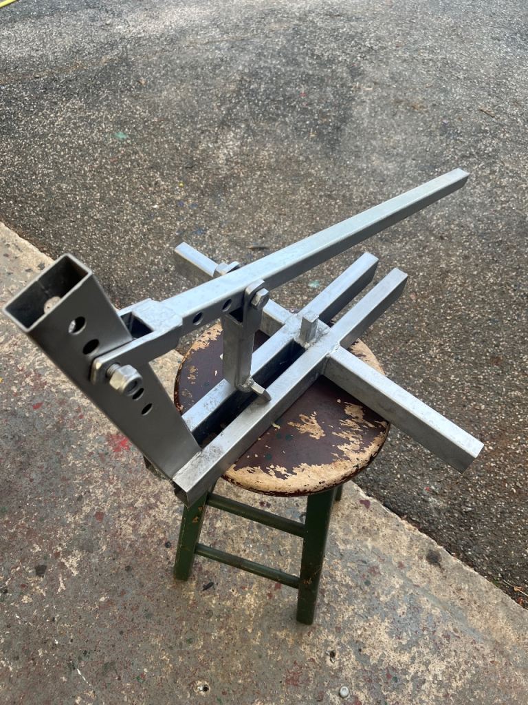 Motorcycle tyre bead breaker.