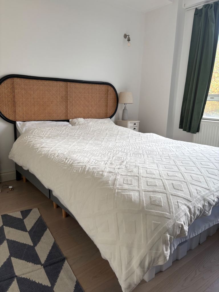 Double bed with rattan frame