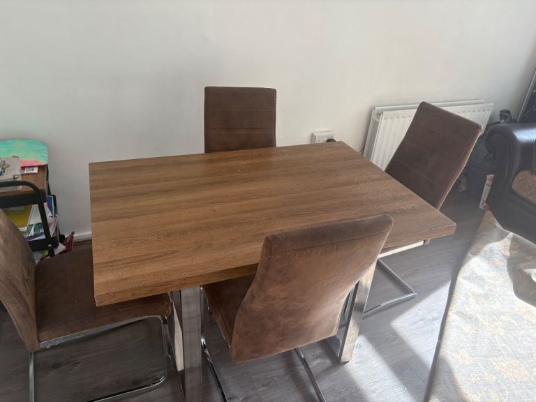 Modern Wooden Dining Table with Four Brown Chairs