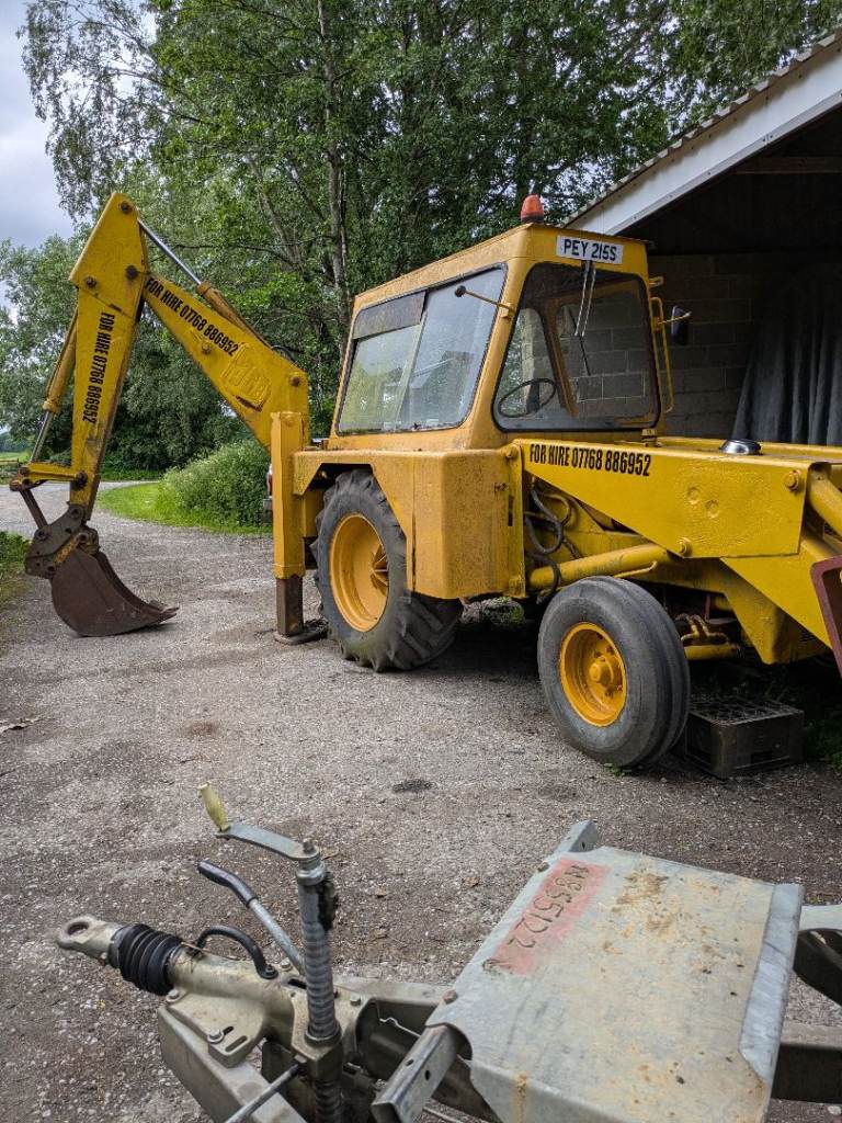JCB white cab 
