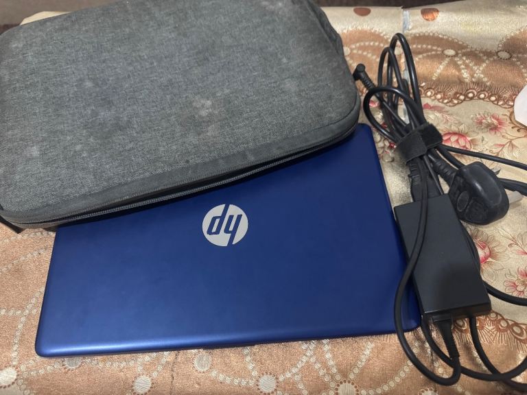 HP laptop with charger and case
