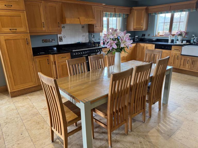 Solid Oak Dining Table with 8 Matching High-Back Chairs