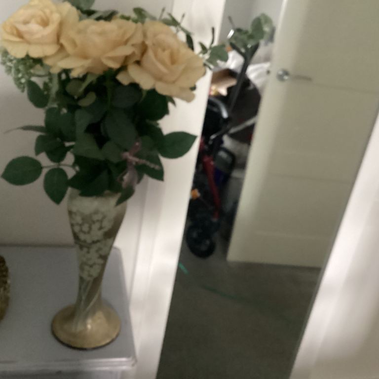 Vase and Artificial Roses